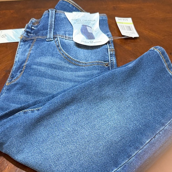 Blue High Rise Jeans by Silver Jeans